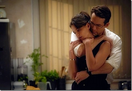 Katie Holmes and Ryan Reynolds as Pam and Randol Schoenberg